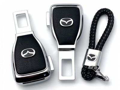 Набір в авто для Mazda №2 / Заглушка перехідник ременя безпеки та брелока з логотипом 36708 фото